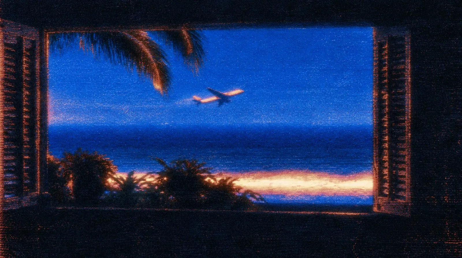 Grainy view through open shutters of a plane climbing over a deep blue sea at dusk